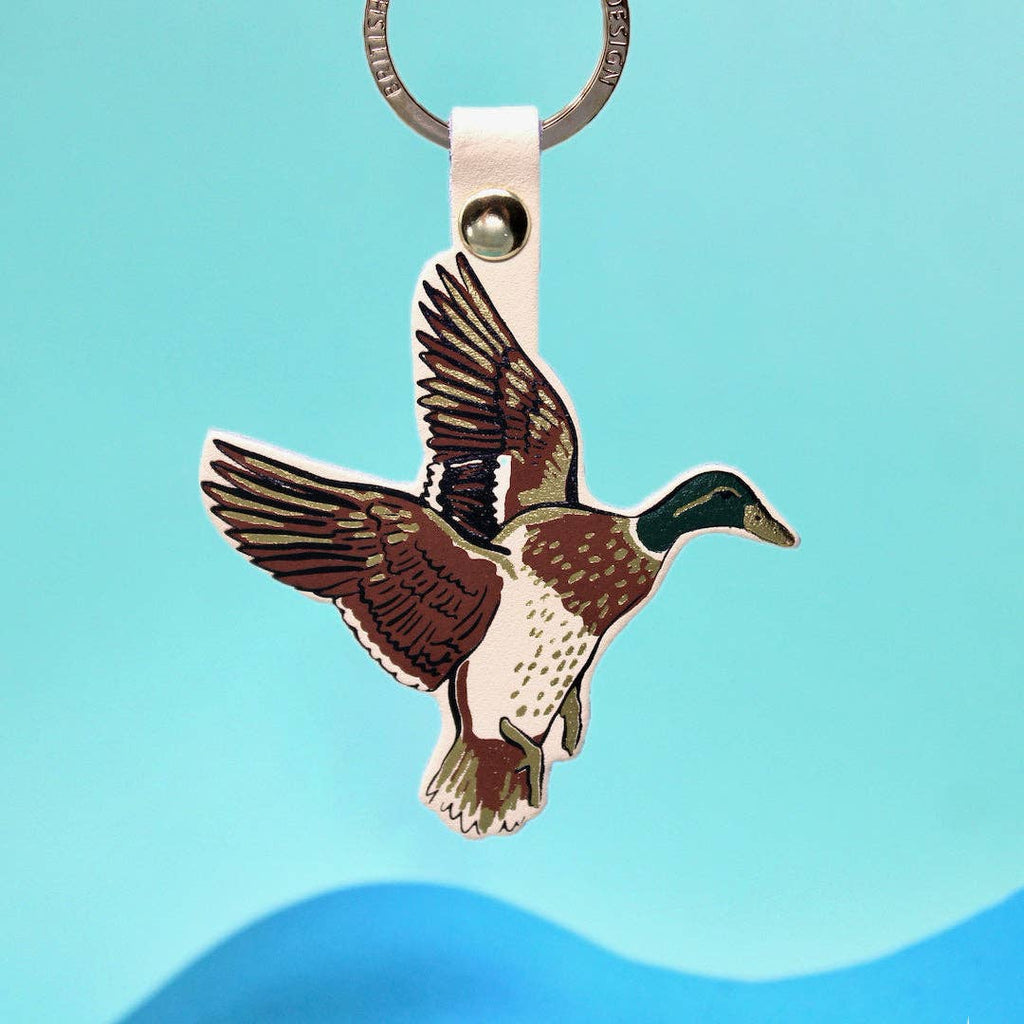 Llavero de pato sagrado