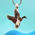 Llavero de pato sagrado